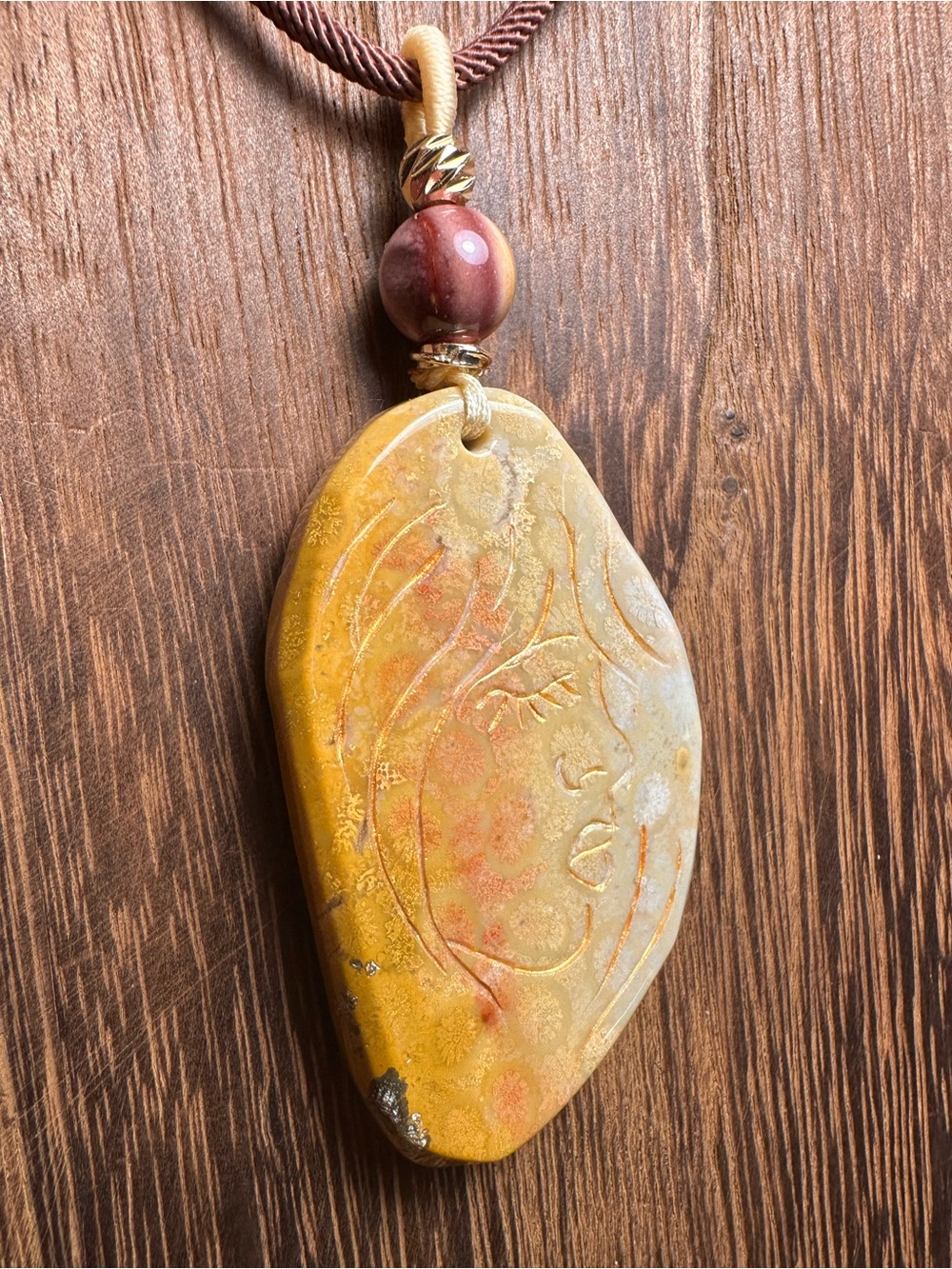 Coral Fossil Lady Profile Pendant Necklace on Brown Rope - Picture 12 of 14